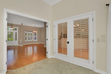 ''Sandwedged'' between the 11th and 12th holes, this Country on Jacksonville Golf and Country Club in Florida - for sale on GolfHomes.com, golf home, golf lot
