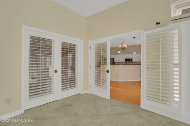 ''Sandwedged'' between the 11th and 12th holes, this Country on Jacksonville Golf and Country Club in Florida - for sale on GolfHomes.com, golf home, golf lot