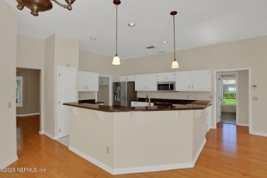 ''Sandwedged'' between the 11th and 12th holes, this Country on Jacksonville Golf and Country Club in Florida - for sale on GolfHomes.com, golf home, golf lot