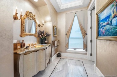 Direct oceanfront French chateau-style estate, set on one of on Sailfish Point Golf Club, Inc. in Florida - for sale on GolfHomes.com, golf home, golf lot