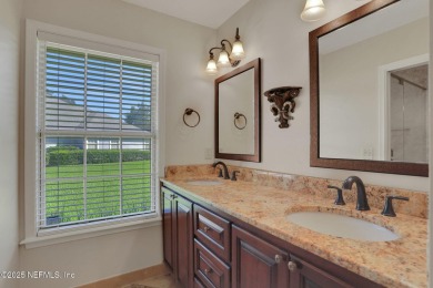 ''Sandwedged'' between the 11th and 12th holes, this Country on Jacksonville Golf and Country Club in Florida - for sale on GolfHomes.com, golf home, golf lot