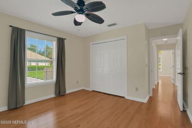 ''Sandwedged'' between the 11th and 12th holes, this Country on Jacksonville Golf and Country Club in Florida - for sale on GolfHomes.com, golf home, golf lot