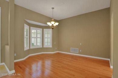 ''Sandwedged'' between the 11th and 12th holes, this Country on Jacksonville Golf and Country Club in Florida - for sale on GolfHomes.com, golf home, golf lot