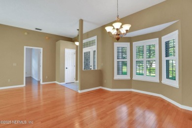 ''Sandwedged'' between the 11th and 12th holes, this Country on Jacksonville Golf and Country Club in Florida - for sale on GolfHomes.com, golf home, golf lot