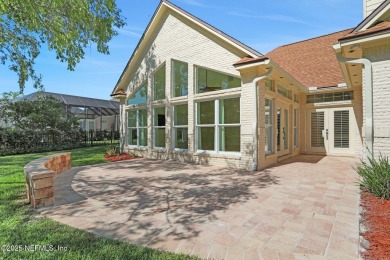 ''Sandwedged'' between the 11th and 12th holes, this Country on Jacksonville Golf and Country Club in Florida - for sale on GolfHomes.com, golf home, golf lot