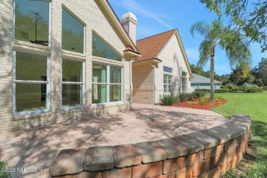 ''Sandwedged'' between the 11th and 12th holes, this Country on Jacksonville Golf and Country Club in Florida - for sale on GolfHomes.com, golf home, golf lot