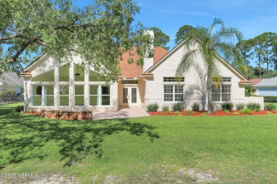 ''Sandwedged'' between the 11th and 12th holes, this Country on Jacksonville Golf and Country Club in Florida - for sale on GolfHomes.com, golf home, golf lot