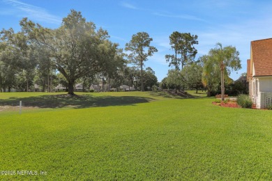 ''Sandwedged'' between the 11th and 12th holes, this Country on Jacksonville Golf and Country Club in Florida - for sale on GolfHomes.com, golf home, golf lot