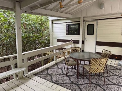 Linville Land Harbor- Relax on the covered deck and  enjoy the on Land Harbor Golf Course in North Carolina - for sale on GolfHomes.com, golf home, golf lot