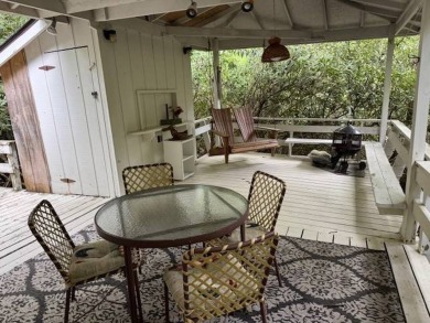Linville Land Harbor- Relax on the covered deck and  enjoy the on Land Harbor Golf Course in North Carolina - for sale on GolfHomes.com, golf home, golf lot