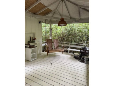 Linville Land Harbor- Relax on the covered deck and  enjoy the on Land Harbor Golf Course in North Carolina - for sale on GolfHomes.com, golf home, golf lot
