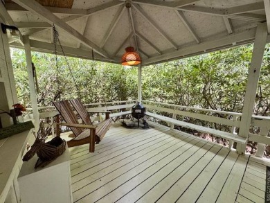 Linville Land Harbor- Relax on the covered deck and  enjoy the on Land Harbor Golf Course in North Carolina - for sale on GolfHomes.com, golf home, golf lot