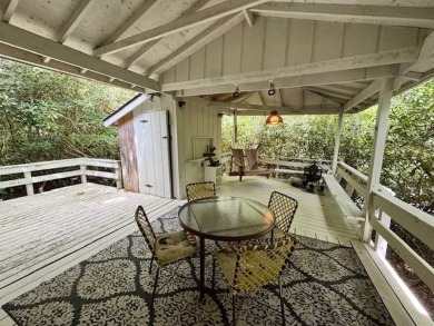 Linville Land Harbor- Relax on the covered deck and  enjoy the on Land Harbor Golf Course in North Carolina - for sale on GolfHomes.com, golf home, golf lot