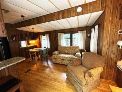 Linville Land Harbor- Relax on the covered deck and  enjoy the on Land Harbor Golf Course in North Carolina - for sale on GolfHomes.com, golf home, golf lot