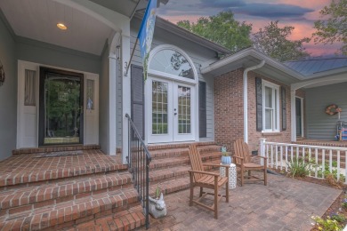 Tucked away on the picturesque fairways of one of Pawleys on Pawleys Plantation Golf and Country Club in South Carolina - for sale on GolfHomes.com, golf home, golf lot