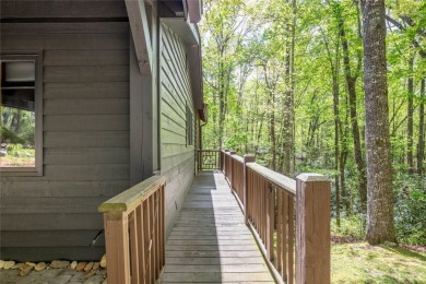 Nestled in the sought-after Holly Forest community, this on Sapphire National Golf Club in North Carolina - for sale on GolfHomes.com, golf home, golf lot