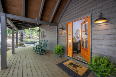 Nestled in the sought-after Holly Forest community, this on Sapphire National Golf Club in North Carolina - for sale on GolfHomes.com, golf home, golf lot