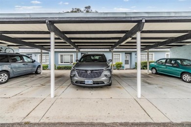 BEAUTIFUL 2 BED / 2 BATH / 1 CARPORT IN THE BEAUTIFUL SEVEN on Seven Springs Golf and Country Club in Florida - for sale on GolfHomes.com, golf home, golf lot