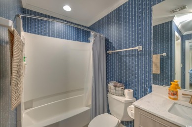 Tucked away on the picturesque fairways of one of Pawleys on Pawleys Plantation Golf and Country Club in South Carolina - for sale on GolfHomes.com, golf home, golf lot