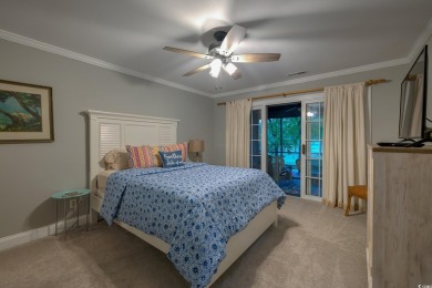 Tucked away on the picturesque fairways of one of Pawleys on Pawleys Plantation Golf and Country Club in South Carolina - for sale on GolfHomes.com, golf home, golf lot
