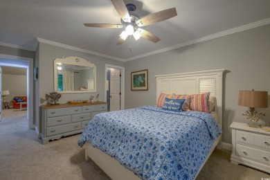 Tucked away on the picturesque fairways of one of Pawleys on Pawleys Plantation Golf and Country Club in South Carolina - for sale on GolfHomes.com, golf home, golf lot