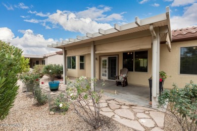 Charming Cactus Flower model in the highly sought-after on Sun City Grand Golf Couse and Club in Arizona - for sale on GolfHomes.com, golf home, golf lot