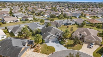 Welcome to this exquisite 3-bedroom, 2-bath Fern designer model on Egret Championship Golf Course in Florida - for sale on GolfHomes.com, golf home, golf lot