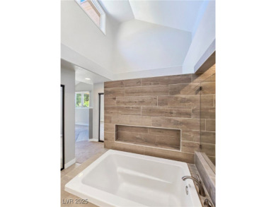 Luxury guard gated private townhome with stunning golf course on Spanish Trail Golf and Country Club in Nevada - for sale on GolfHomes.com, golf home, golf lot