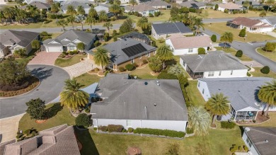 Welcome to this exquisite 3-bedroom, 2-bath Fern designer model on Egret Championship Golf Course in Florida - for sale on GolfHomes.com, golf home, golf lot