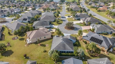 Welcome to this exquisite 3-bedroom, 2-bath Fern designer model on Egret Championship Golf Course in Florida - for sale on GolfHomes.com, golf home, golf lot