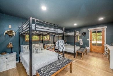 Nestled in the sought-after Holly Forest community, this on Sapphire National Golf Club in North Carolina - for sale on GolfHomes.com, golf home, golf lot