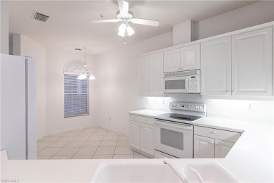 Perfect clean slate condo to put your own style on in the on Pelican Marsh Golf Club in Florida - for sale on GolfHomes.com, golf home, golf lot