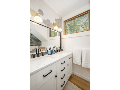 Nestled in the sought-after Holly Forest community, this on Sapphire National Golf Club in North Carolina - for sale on GolfHomes.com, golf home, golf lot