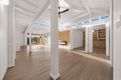 STUNNING ARCHITECTURE - 575 BELVEDERE DR.  BELVEDERE GARDENS on Belvedere Golf Club in Arkansas - for sale on GolfHomes.com, golf home, golf lot