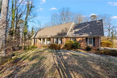 You would never know the size from the front BUT this has 4 beds on Greensboro Country Club - Carlson Farm Course in North Carolina - for sale on GolfHomes.com, golf home, golf lot