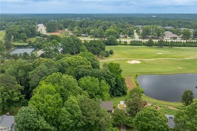 You would never know the size from the front BUT this has 4 beds on Greensboro Country Club - Carlson Farm Course in North Carolina - for sale on GolfHomes.com, golf home, golf lot