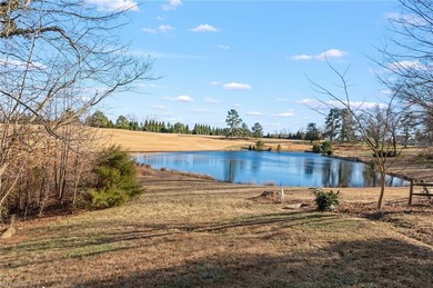 You would never know the size from the front BUT this has 4 beds on Greensboro Country Club - Carlson Farm Course in North Carolina - for sale on GolfHomes.com, golf home, golf lot