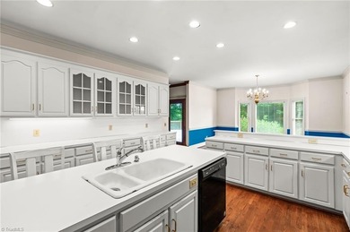 You would never know the size from the front BUT this has 4 beds on Greensboro Country Club - Carlson Farm Course in North Carolina - for sale on GolfHomes.com, golf home, golf lot