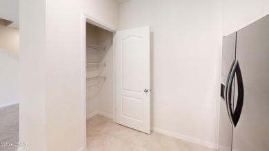 Practically brand new 3 bed 2 1/2 bathroom townhome move-in on Riviera Country Club in Florida - for sale on GolfHomes.com, golf home, golf lot