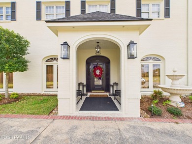 An Iconic French Quarter-Inspired Estate in the Heart of on LeTriomphe Golf and Country Club in Louisiana - for sale on GolfHomes.com, golf home, golf lot