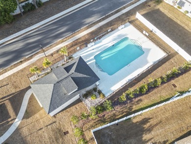 Welcome to this exceptional 5-bedroom, 3-bathroom corner-lot on Surf Golf and Beach Club in South Carolina - for sale on GolfHomes.com, golf home, golf lot