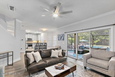 Outdoors is where you'll truly live in this gorgeous pool home on St. Johns Golf and Country Club in Florida - for sale on GolfHomes.com, golf home, golf lot