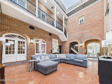 An Iconic French Quarter-Inspired Estate in the Heart of on LeTriomphe Golf and Country Club in Louisiana - for sale on GolfHomes.com, golf home, golf lot