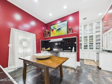 An Iconic French Quarter-Inspired Estate in the Heart of on LeTriomphe Golf and Country Club in Louisiana - for sale on GolfHomes.com, golf home, golf lot