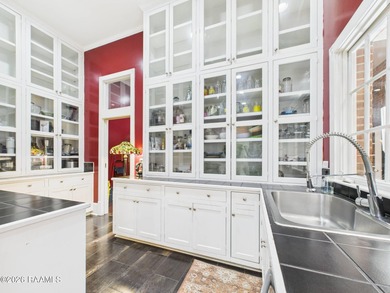 An Iconic French Quarter-Inspired Estate in the Heart of on LeTriomphe Golf and Country Club in Louisiana - for sale on GolfHomes.com, golf home, golf lot