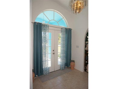 Impressive 4 Bedroom, 3 Bathroom POOL HOME with attached 2 Car on Deep Creek Golf Club in Florida - for sale on GolfHomes.com, golf home, golf lot