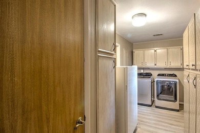 Stunning 5BR, 2.5BA golf course home with lake views on Hole #14 on Lake Kiowa Golf Course in Texas - for sale on GolfHomes.com, golf home, golf lot