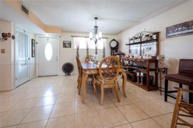 Charming one-bedroom, one and a half-bath condo in Hollybrook, a on Hollybrook Golf and Tennis Club  in Florida - for sale on GolfHomes.com, golf home, golf lot