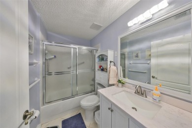 TERRIFIC PRICE IMPROVEMENT FOR THIS BEAUTIFULLY UPDATED CONDO on Scepter Golf Club in Florida - for sale on GolfHomes.com, golf home, golf lot