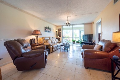 Charming one-bedroom, one and a half-bath condo in Hollybrook, a on Hollybrook Golf and Tennis Club  in Florida - for sale on GolfHomes.com, golf home, golf lot